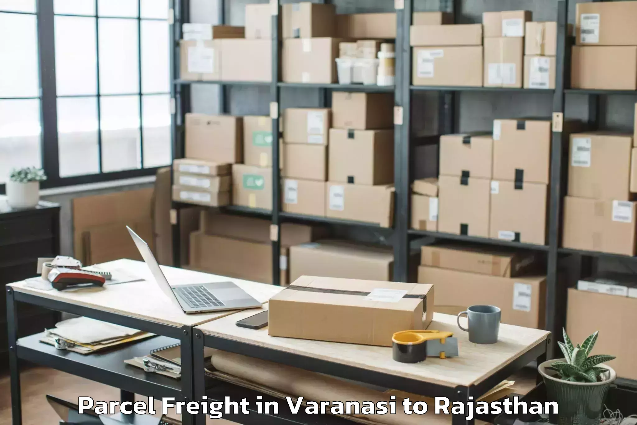 Varanasi to Niit University Neemrana Parcel Freight